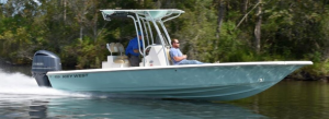 key west boat, 2 men, on water, yamaha engine